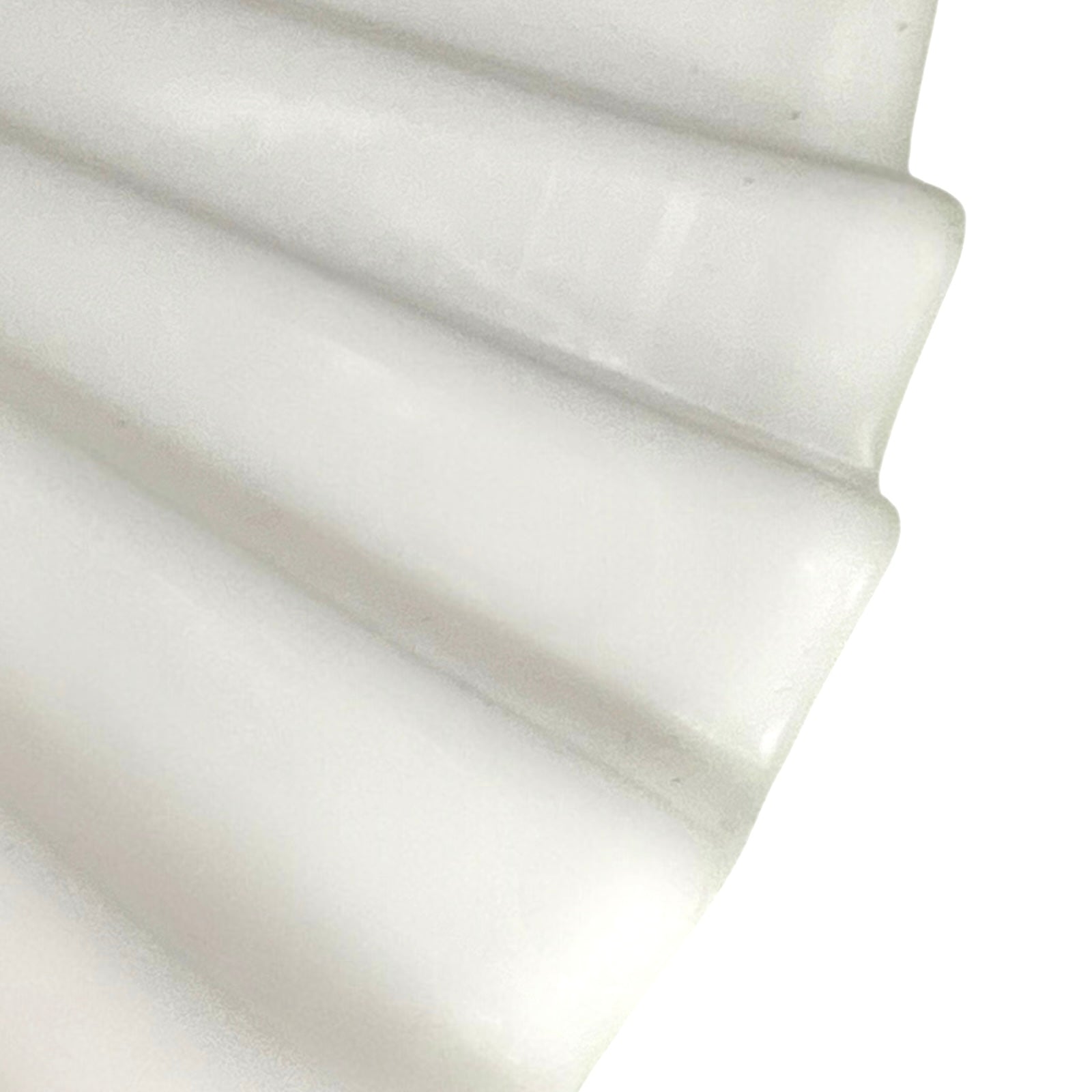 Close up of French glass lampshade on a white background