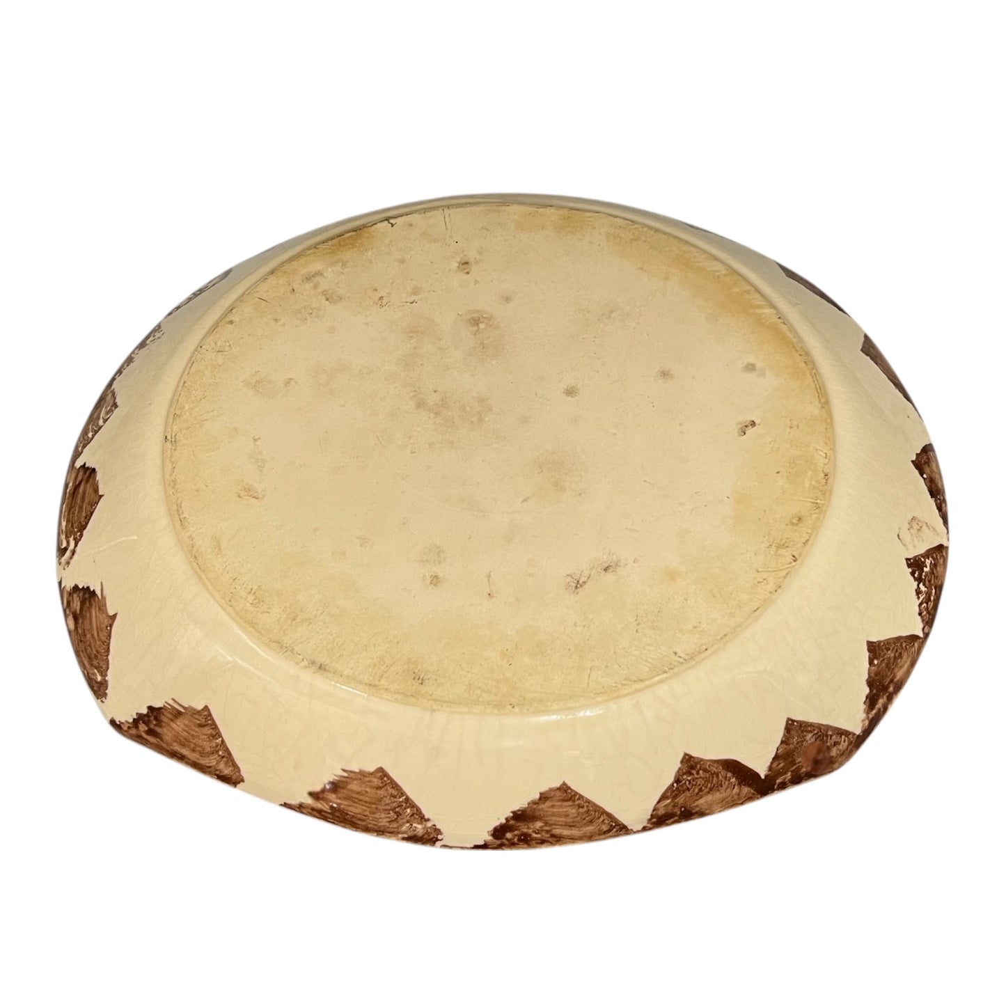 Reverse of a French dinner plate on a white background