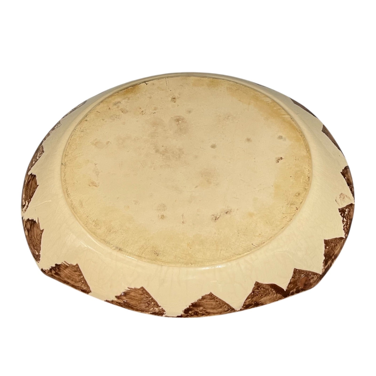 Reverse of a French dinner plate on a white background