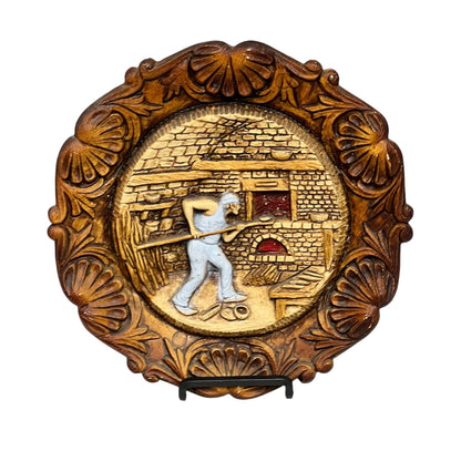 French vintage circular raised 3d wood resin wall plaque on a white background