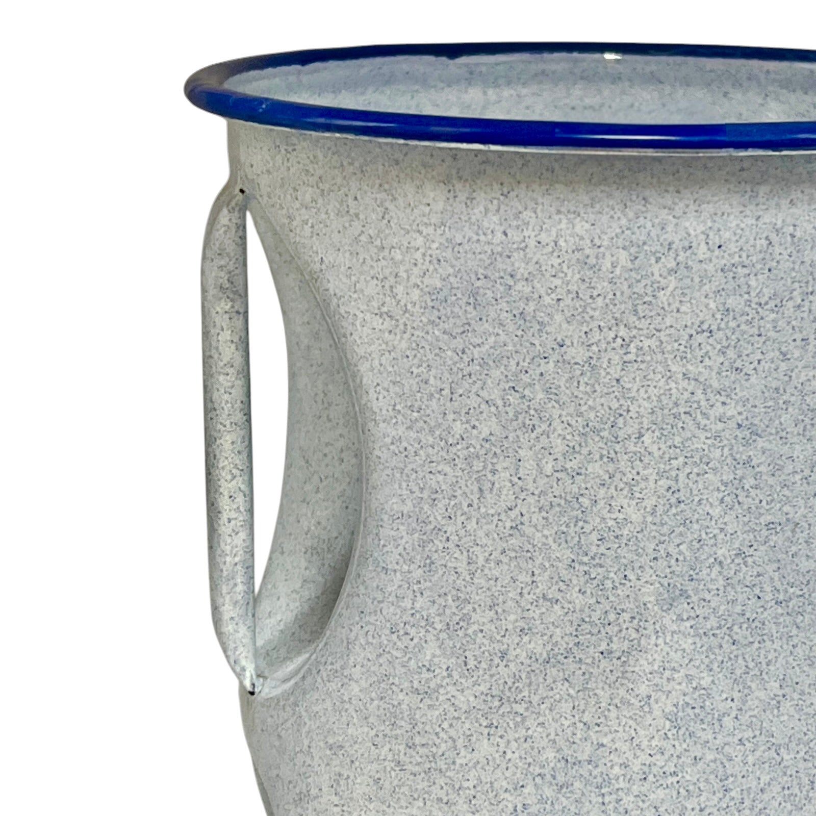 Close-up of a speckled blue enamel mug with a blue rim and a side handle, shown against a white background.