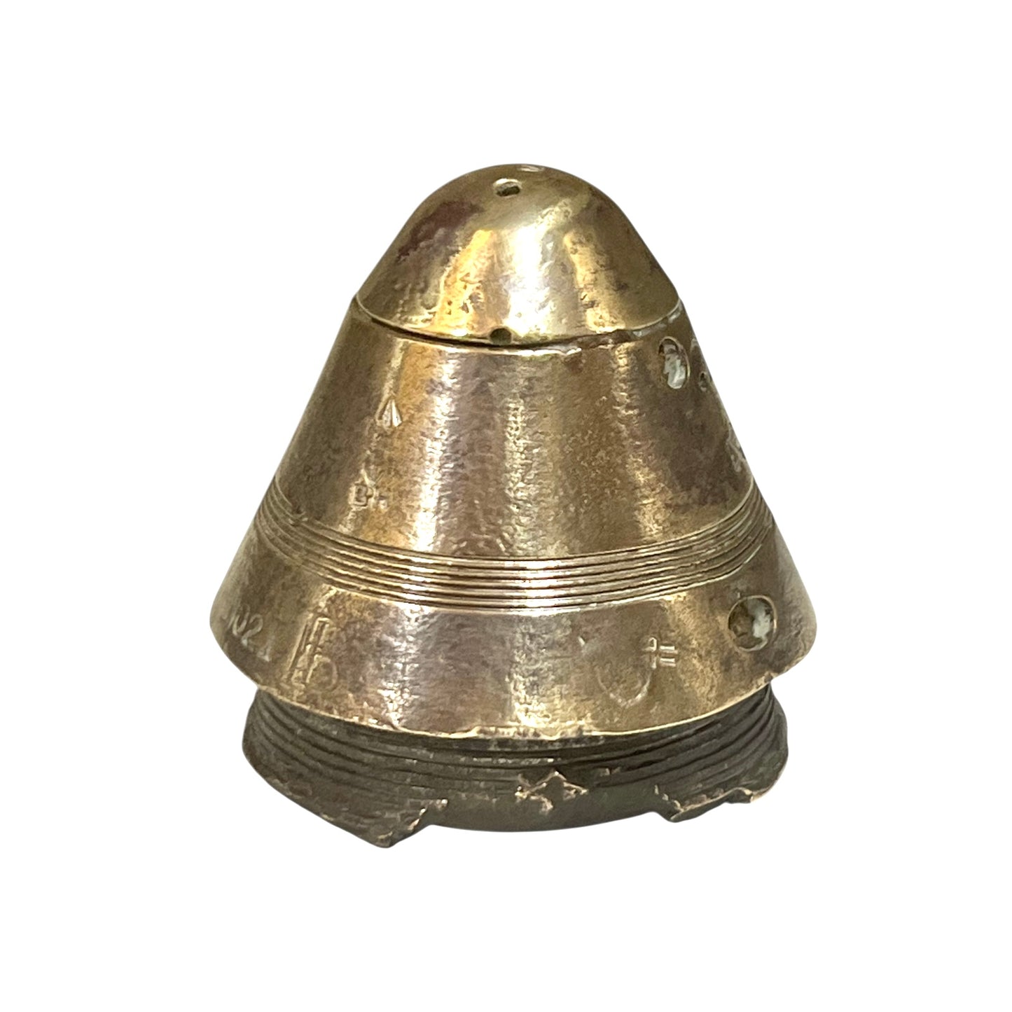 WW1 brass fuse paperweight on a white background