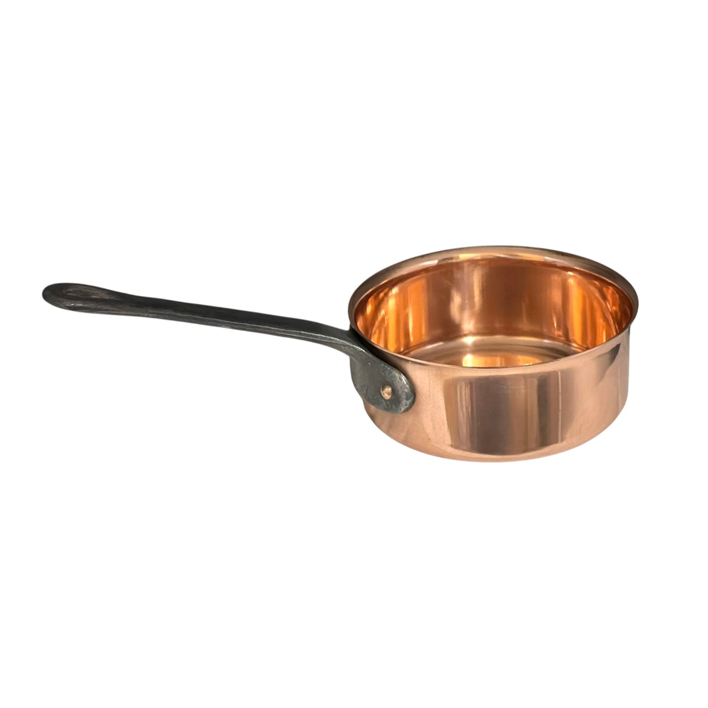 Small copper saucepan with a black handle on a white background