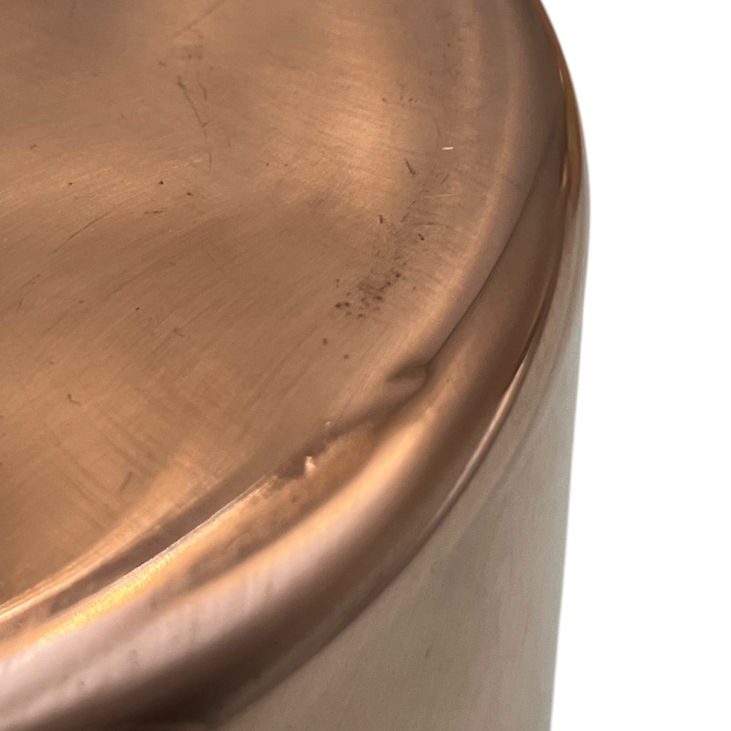 base rim of copper pan