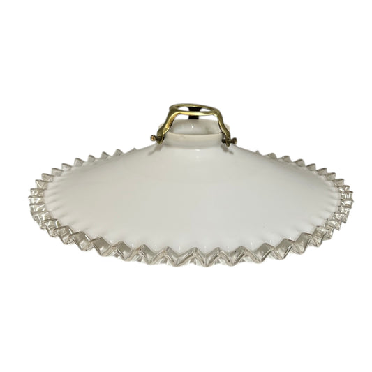 A white glass lampshade with a scalloped edge and gold fixture, perfect for adding a touch of period charm or retro flair to any home, set against a clean white background.