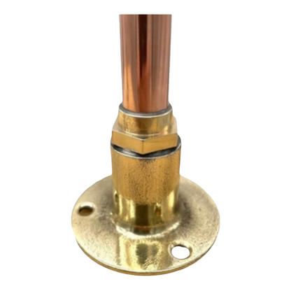 Copper pipe with brass fitting on a white background