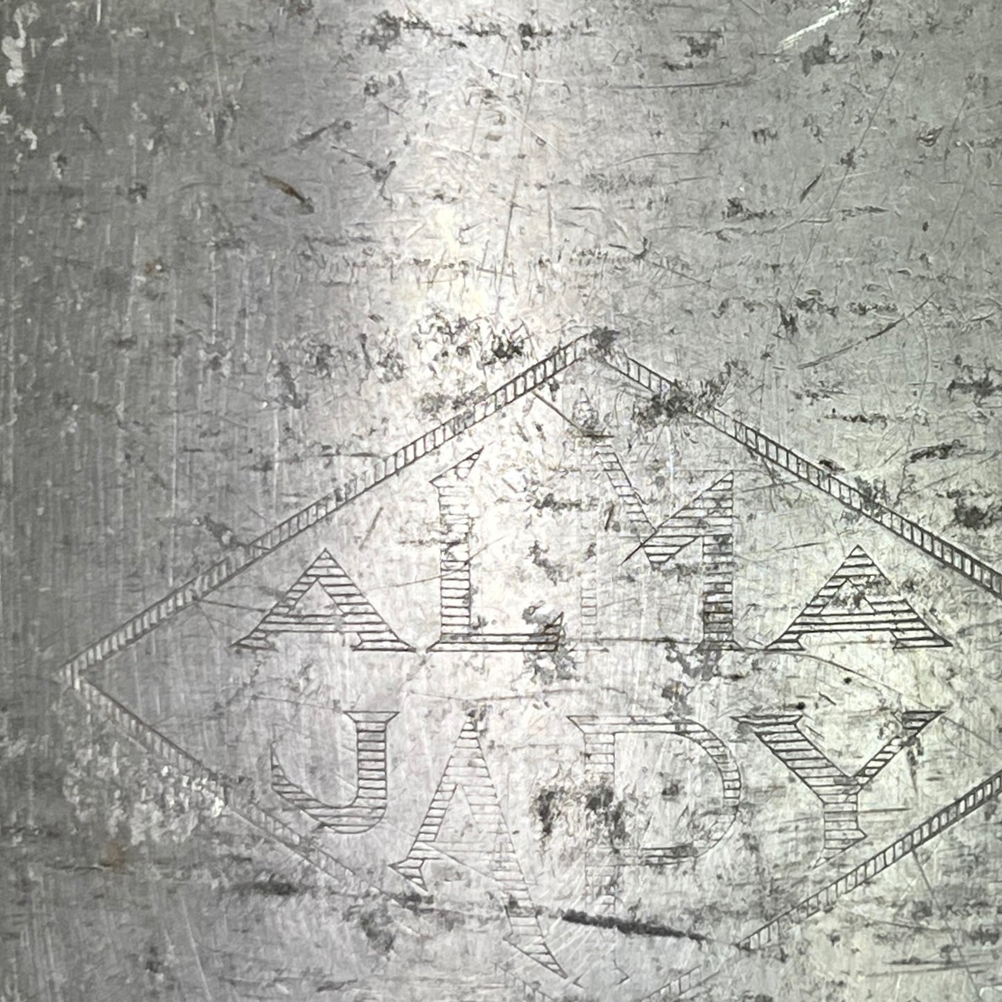 Close-up of a grey milk churn on a white background