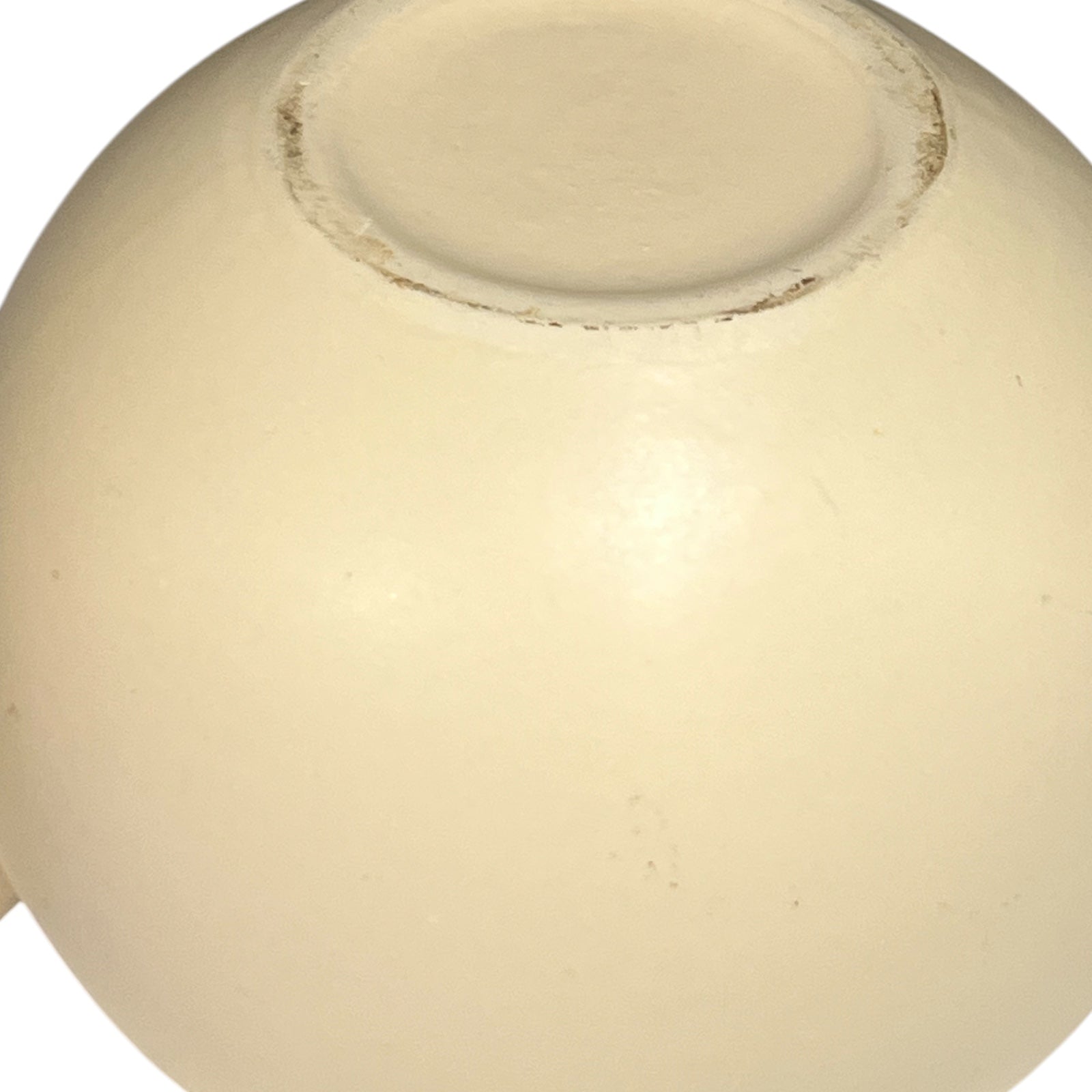 Close-up of a beige ceramic bowl on a white background