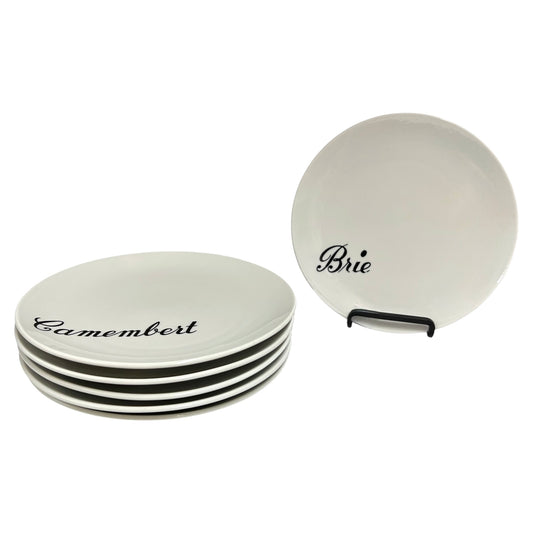 Set of ceramic cheese dishes with 'Camembert' and 'Brie' labels on a white background