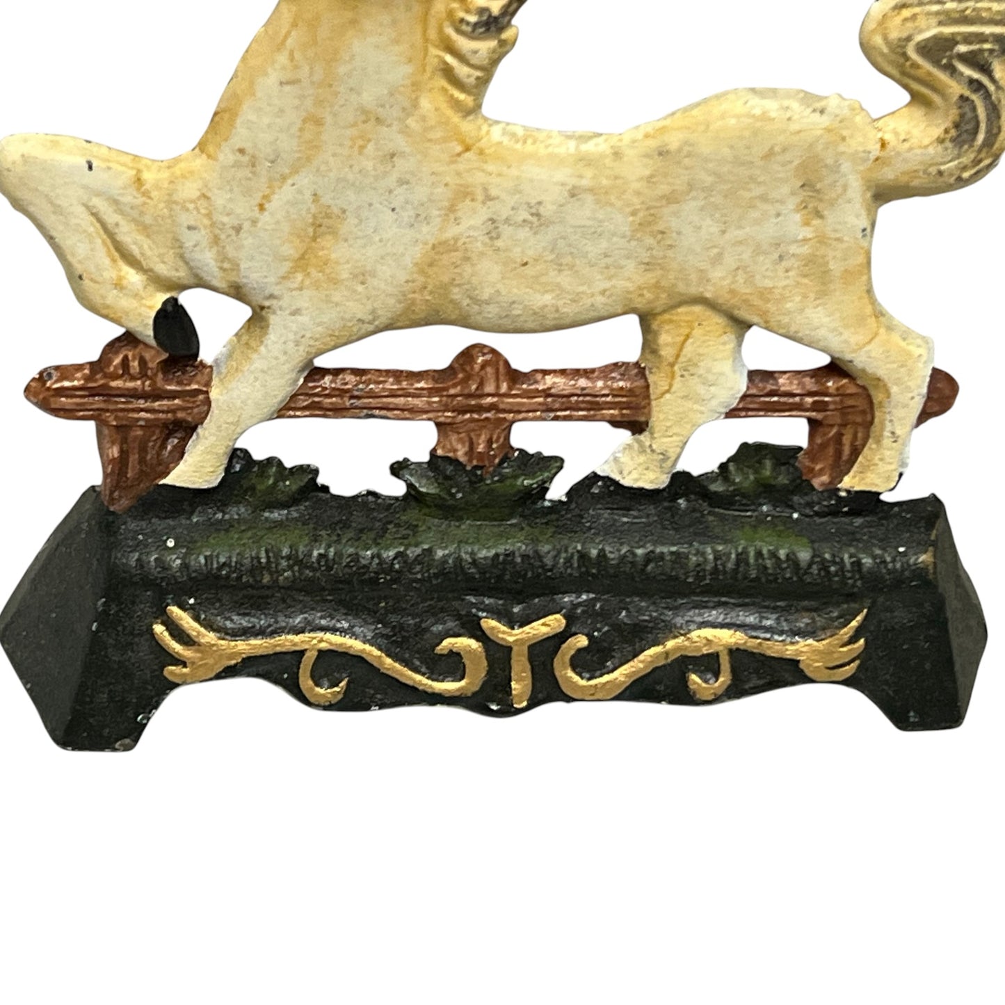 close up of a doorstop on a white background