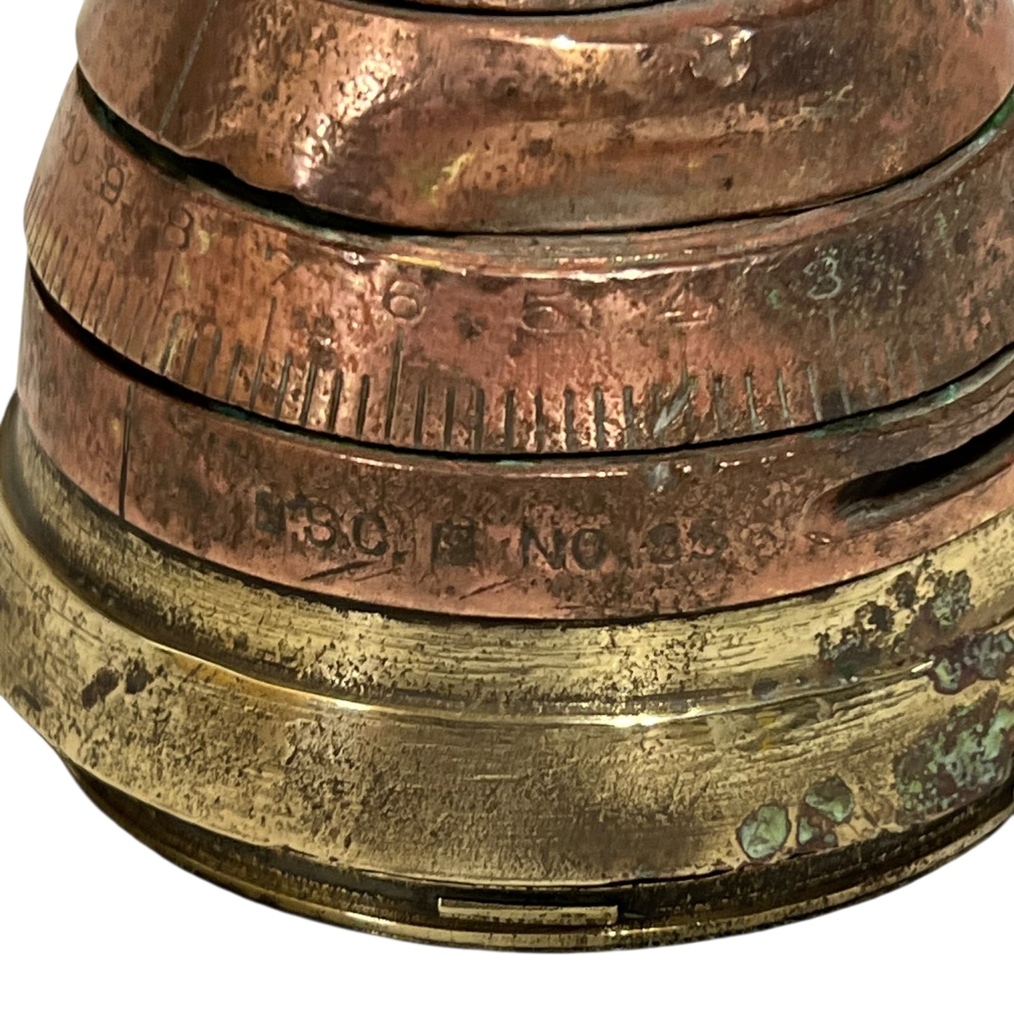 WW1 brass fuse paperweight on a white background