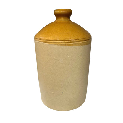 close up of a ww1 SRD jar on a white background 