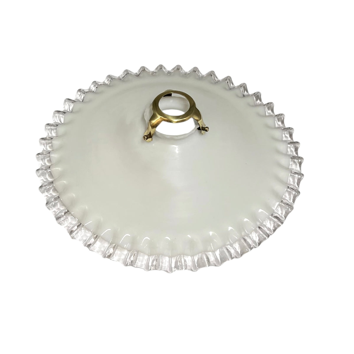 A vintage oval glass shade or cover with a scalloped, fluted edge and a central brass ring handle, shown on a plain white background.