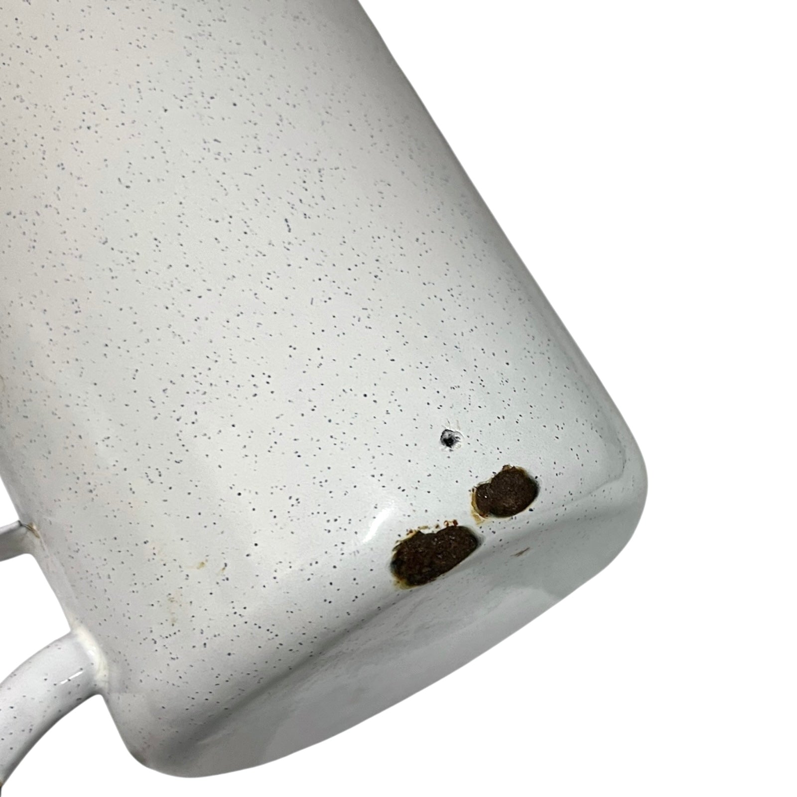 Close-up of a enamel planter with speckled pattern on a white background