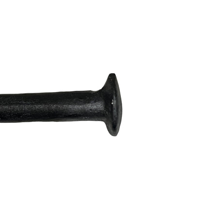 Close-up of a cow toilet roll holder on a white background