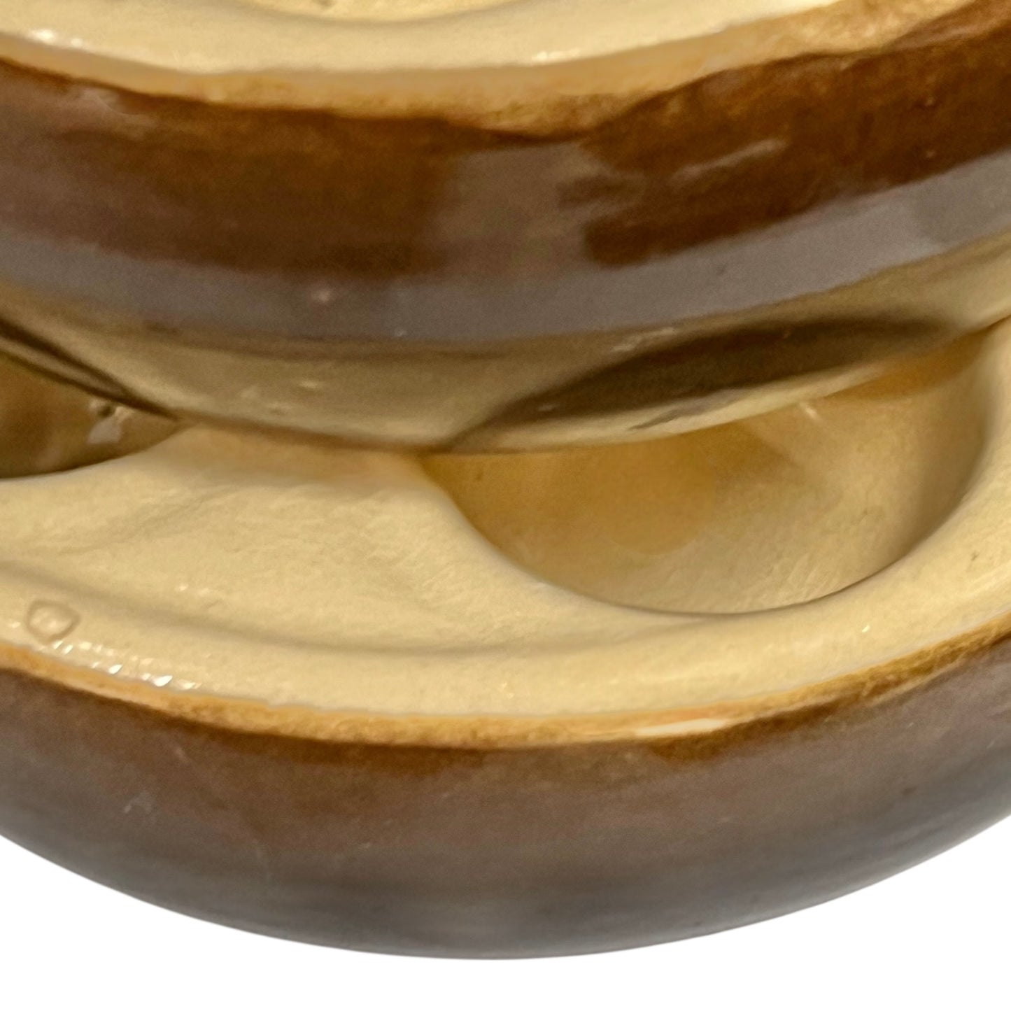 Close up of snail plates with handles on a white background