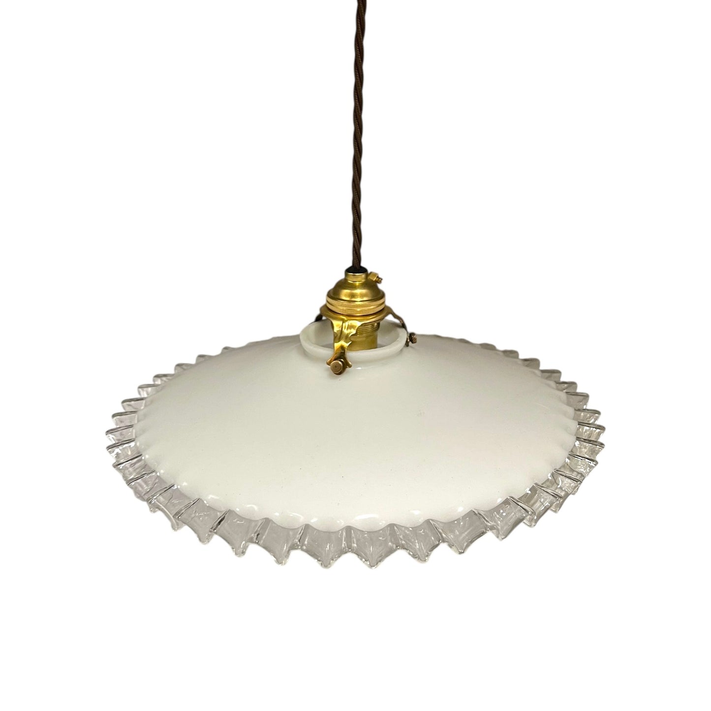 Vintage-style pendant light with white glass shade and brass fitting on a white background