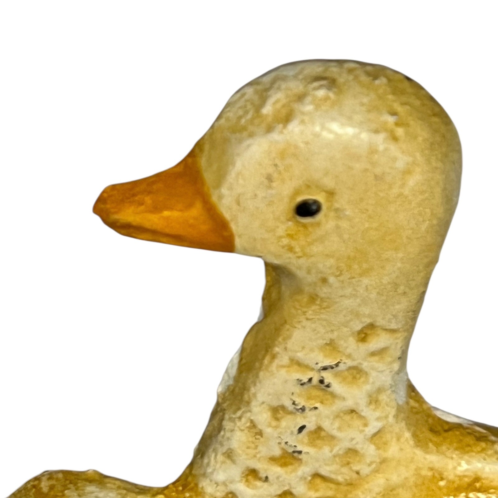 Close up of French farmhouse style goose cast iron toilet roll holder on a white background