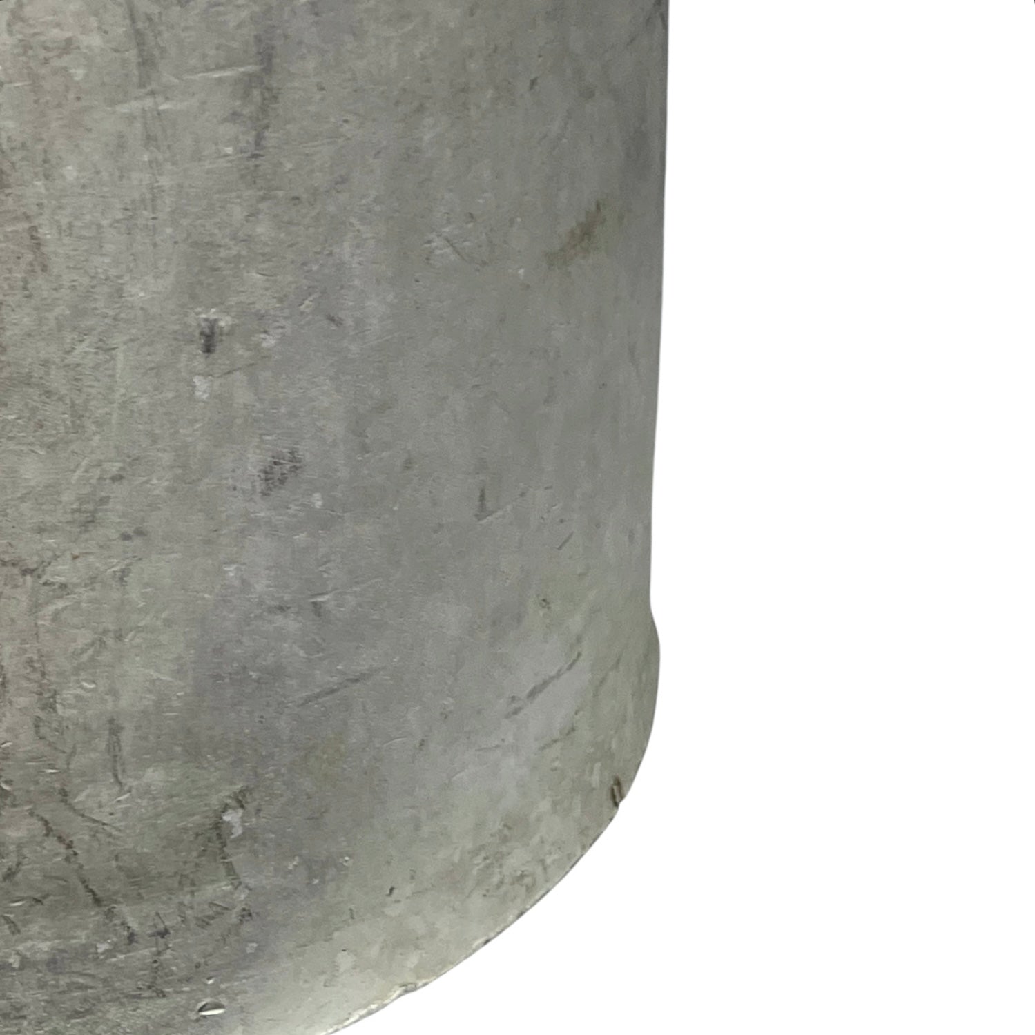 Close up of a vintage metal milk churn on a white background