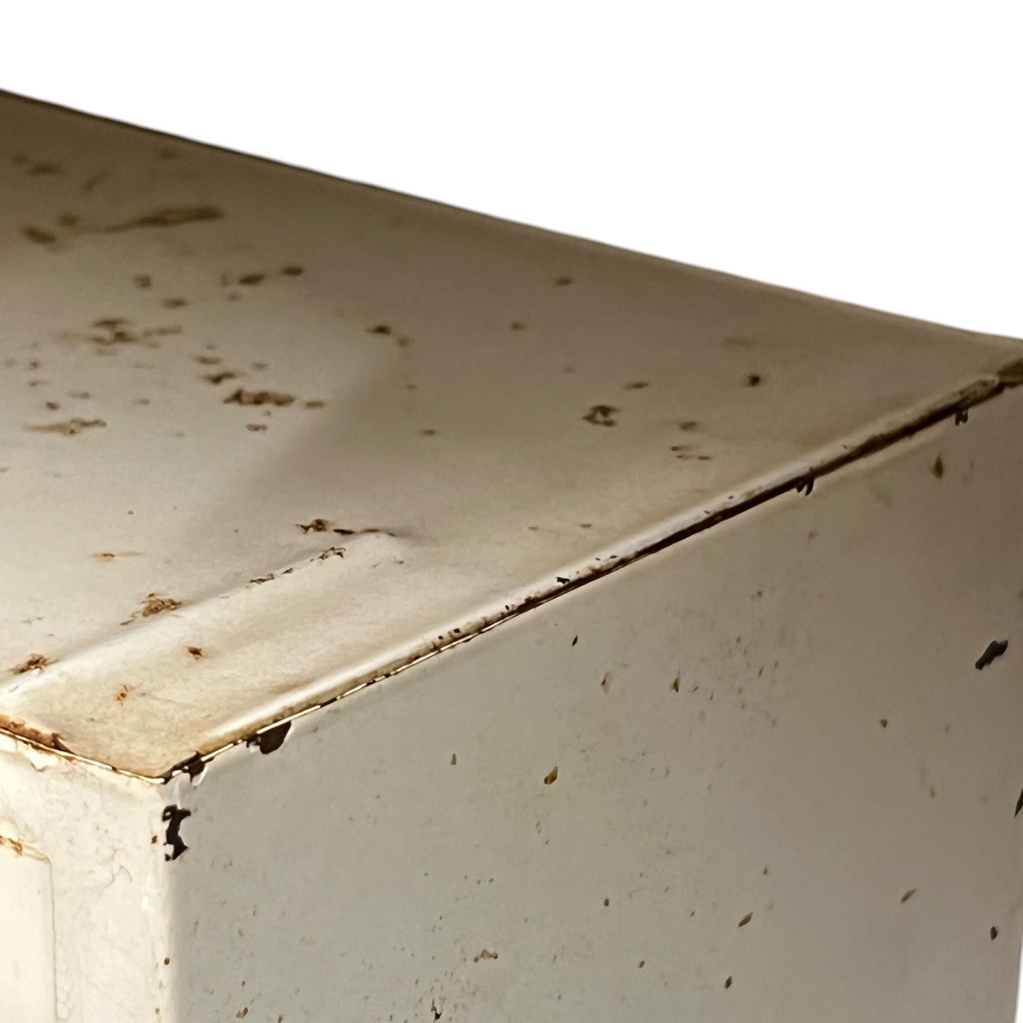 close up of a vintage metal bathroom cabinet