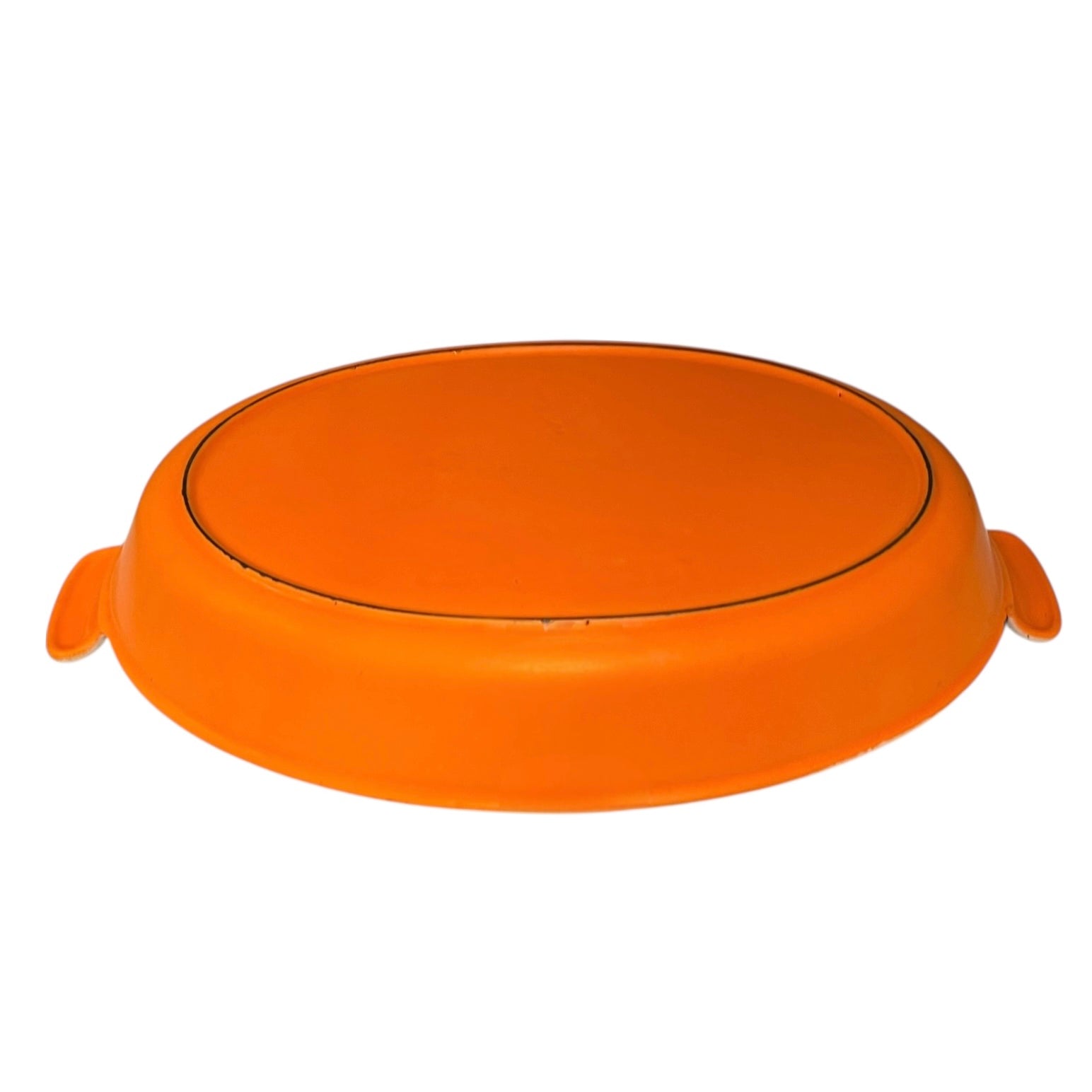 Le Creuset cast iron orange dish on a white background