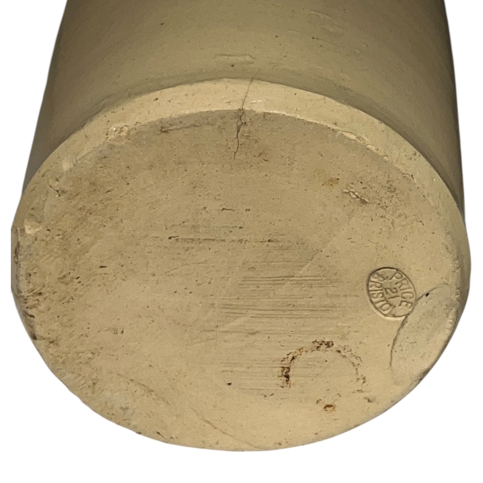 Close up of a beige cylindrical WW1 jar on a white background