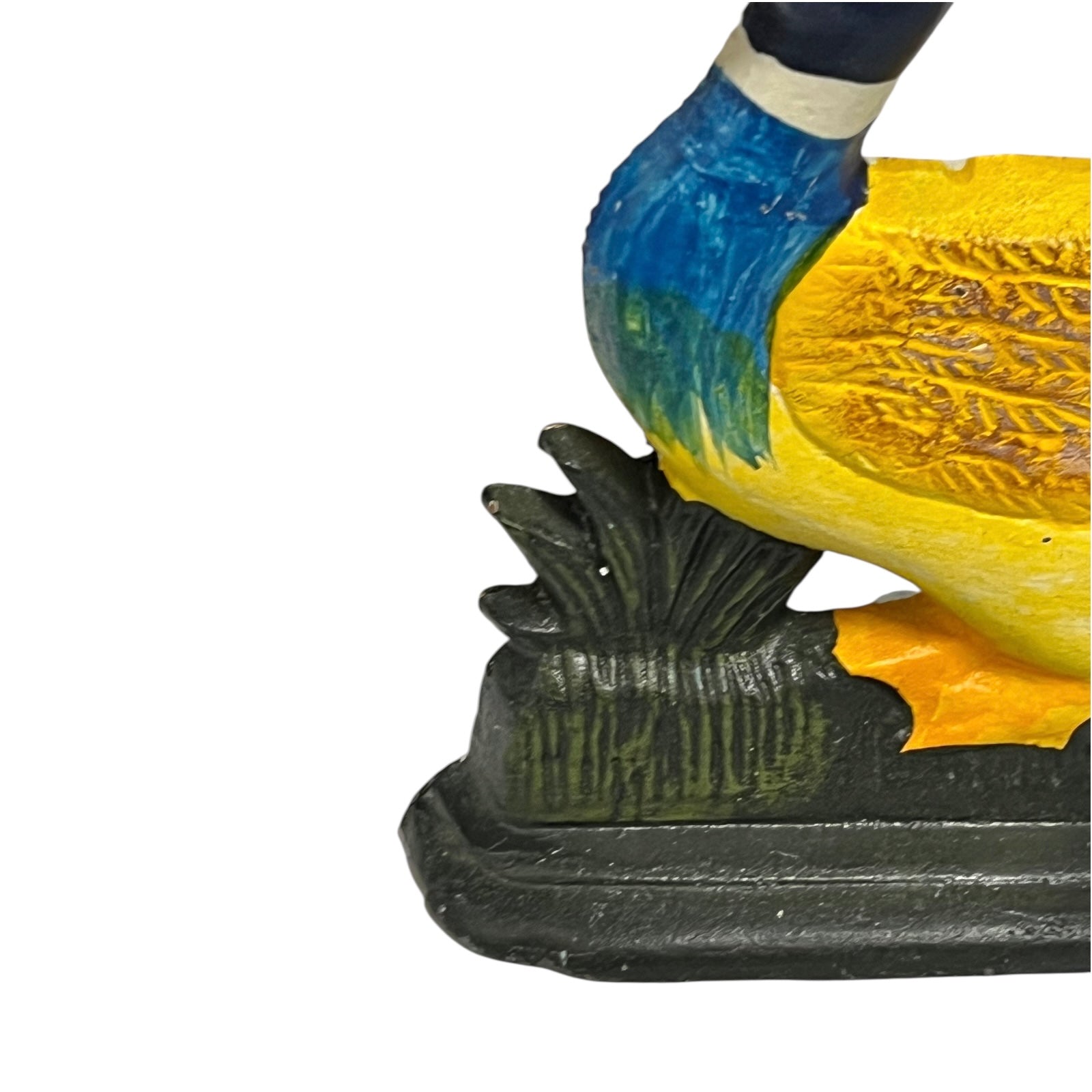 Close up of cast iron doorstop on a white background