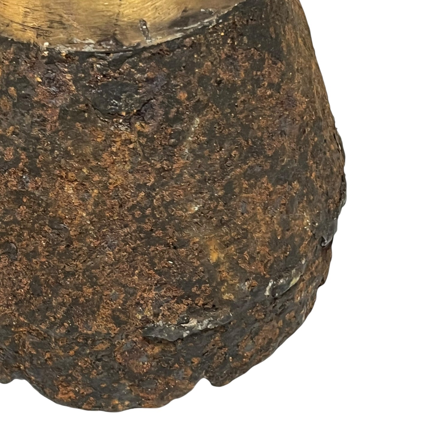 Close up of WW1 brass fuse on a white background