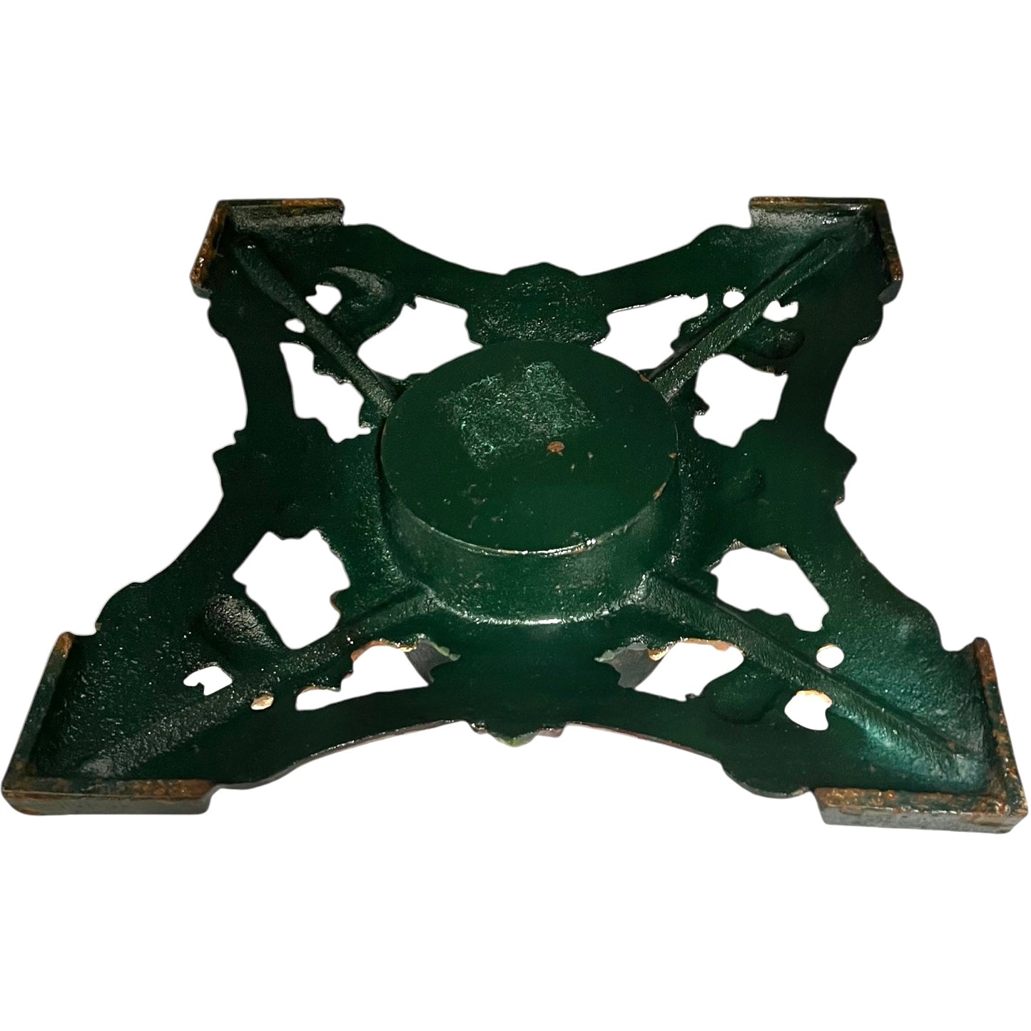 Close up of cast iron Christmas Tree holder on a white background