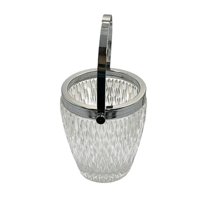 French vintage glass ice bucket with a silver coloured collar and a handle on a white background 