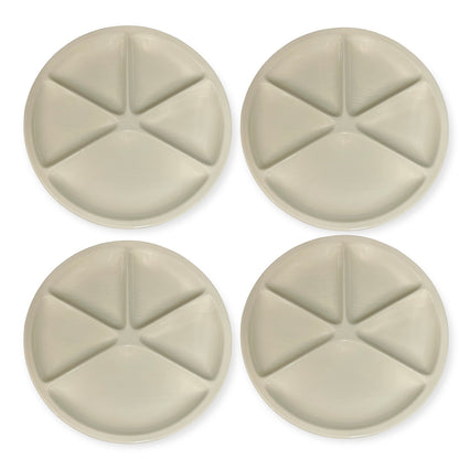 Set of beige Le Creuset divided fondue plates  on a white background