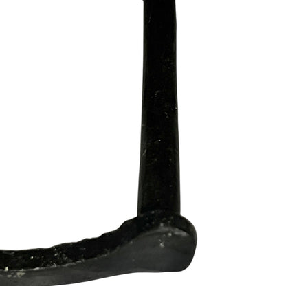 Close-up of a cow-shaped toiler paper roll holder  on a white background