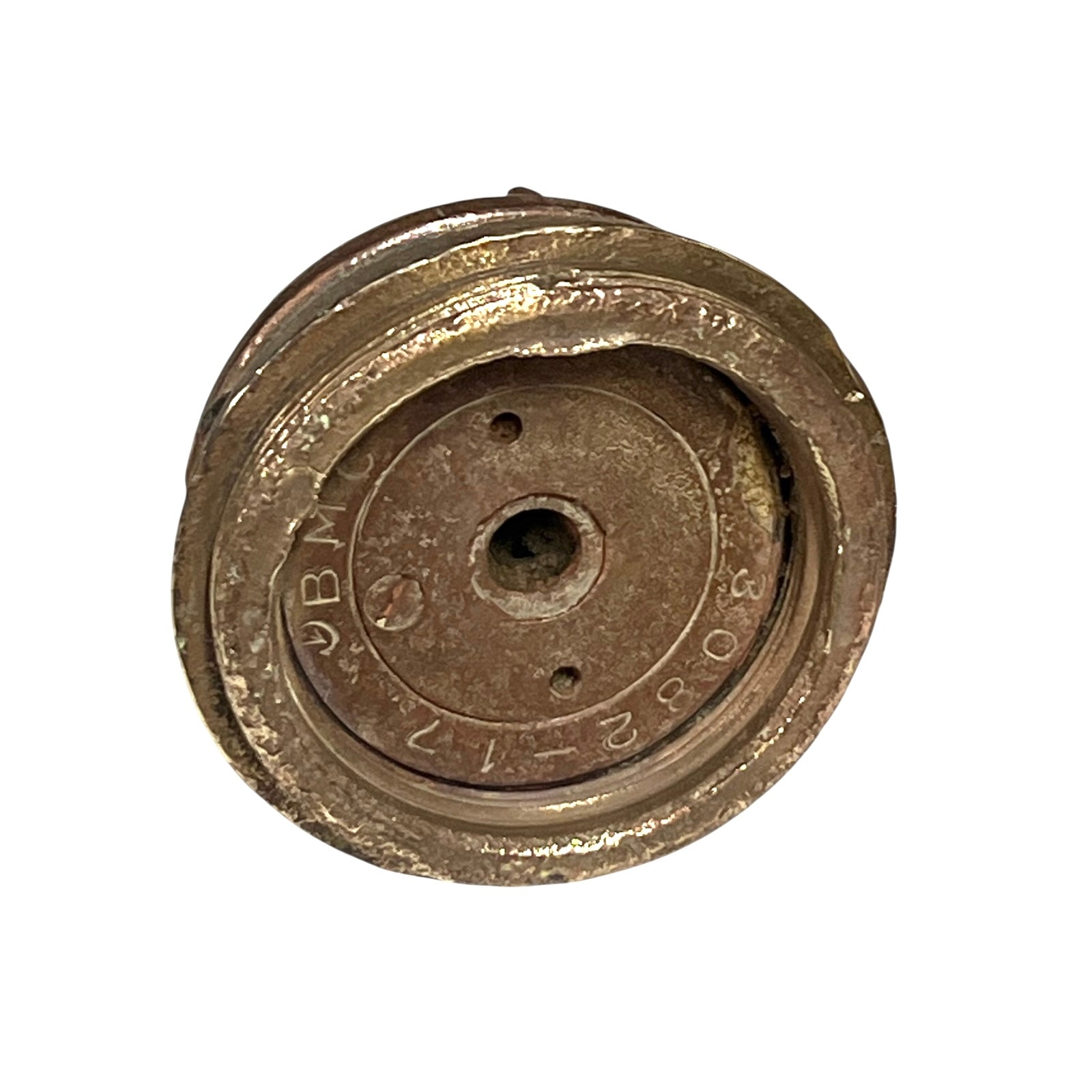 Close up of WW1 brass fuse on a white background