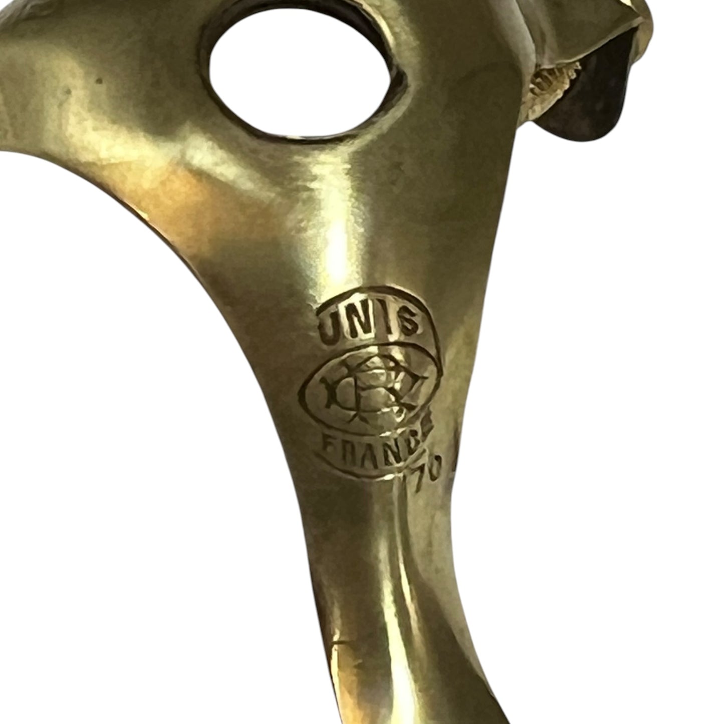 Brass gallery for holding a pendant lamp shade  on a white background