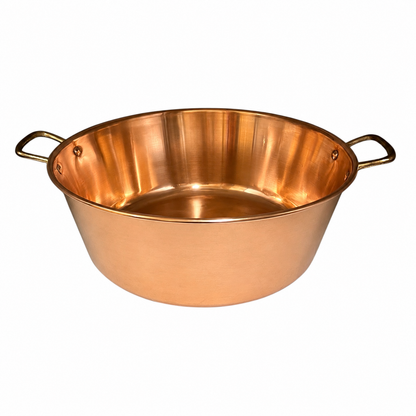 Copper basin with brass handles on a white background 