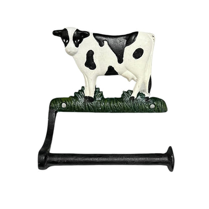 Decorative paper towel holder with a cow design on a white background