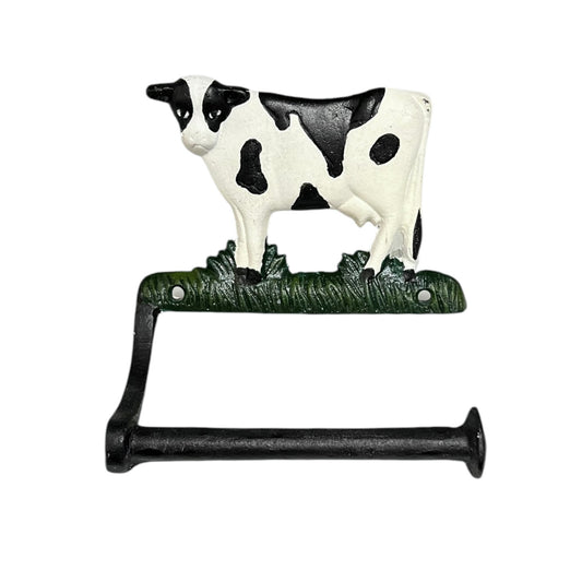Decorative paper towel holder with a cow design on a white background