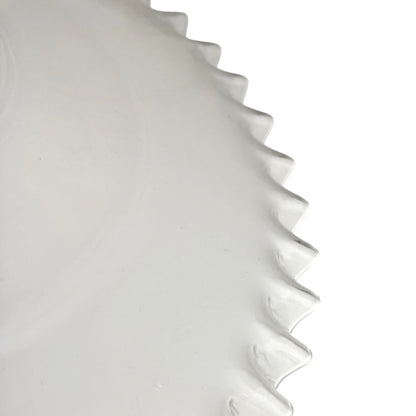 Close-up of a glass lampshade on a white background