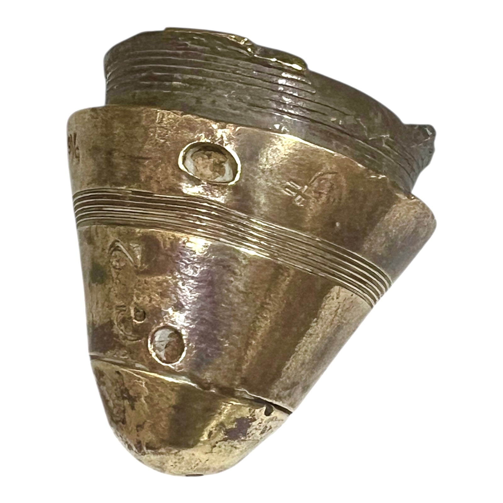 WW1 brass fuse paperweight on a white background