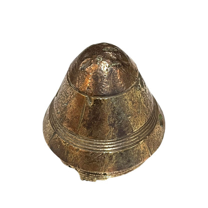 WW1 brass fuse paperweight on a white background 