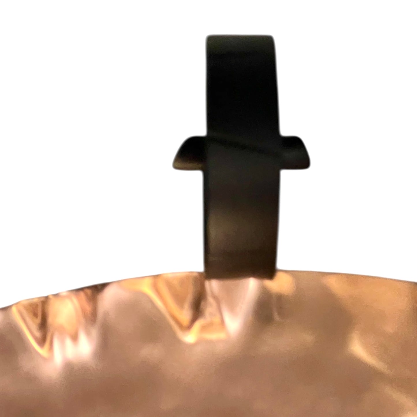 Close-up of a copper fruit bowl on a white background