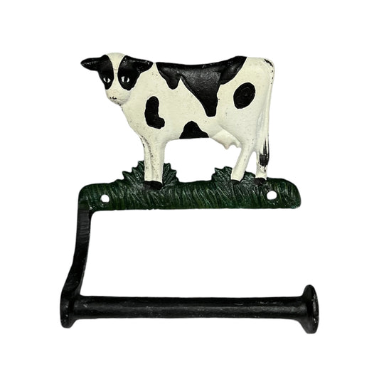 Cow-shaped toilet paper holder on a white background