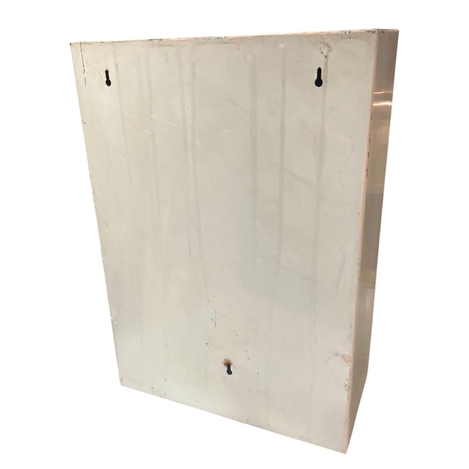 Close-up of the back of a bathroom cabinet.