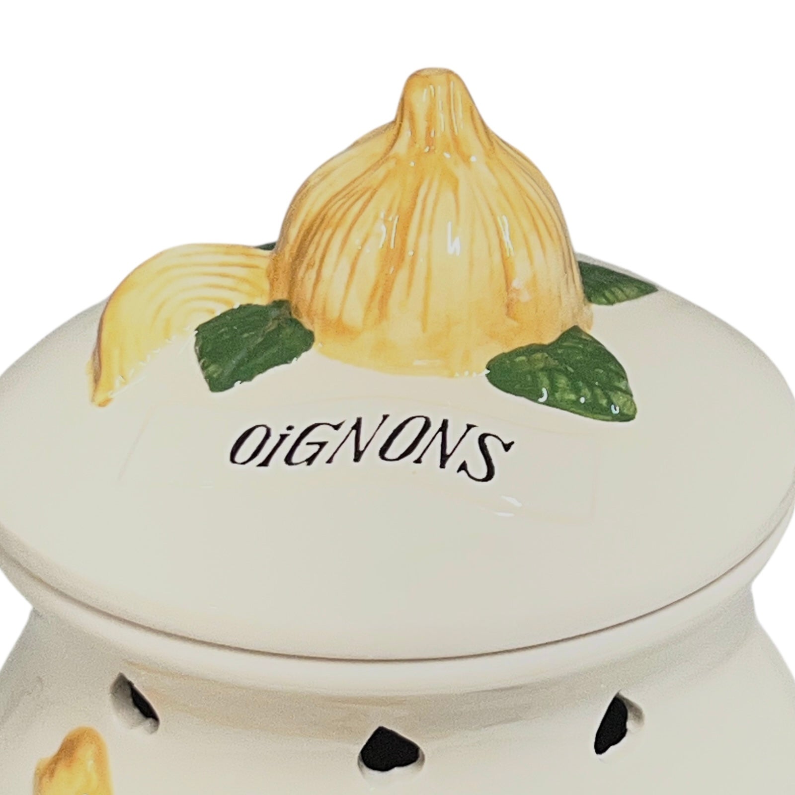 Ceramic container with onion design and 'OIGNONS' text on a white background