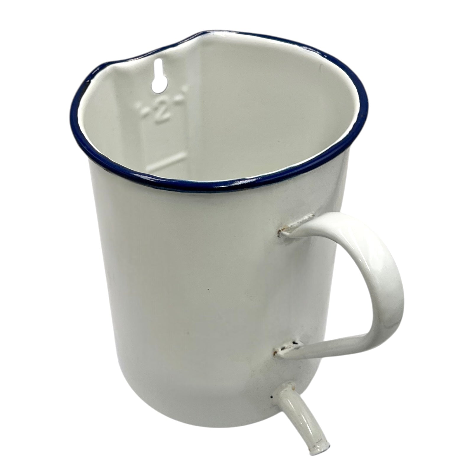 White enamel jug with blue rim and spout on a white background