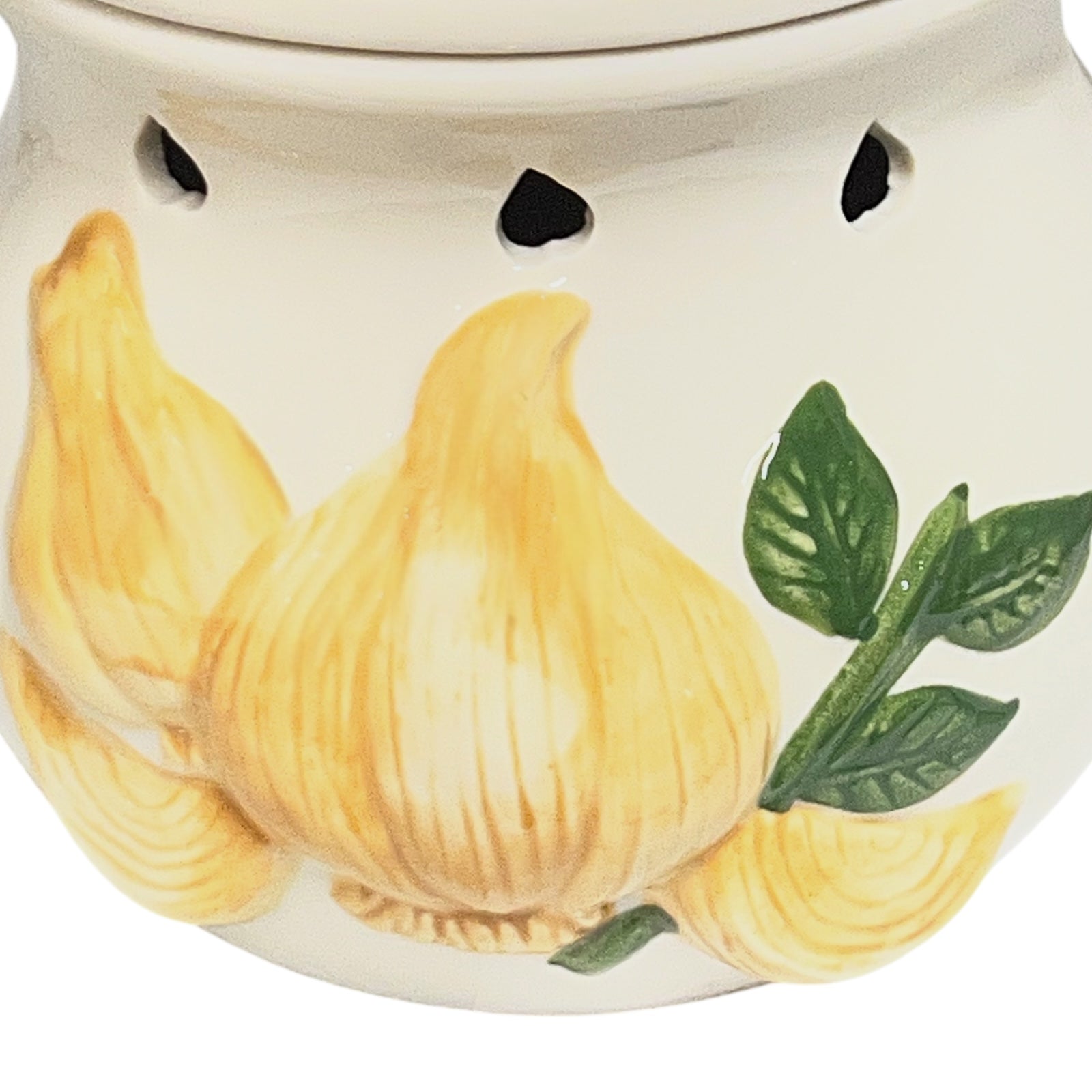 Decorative item with onions and leaves on a white background