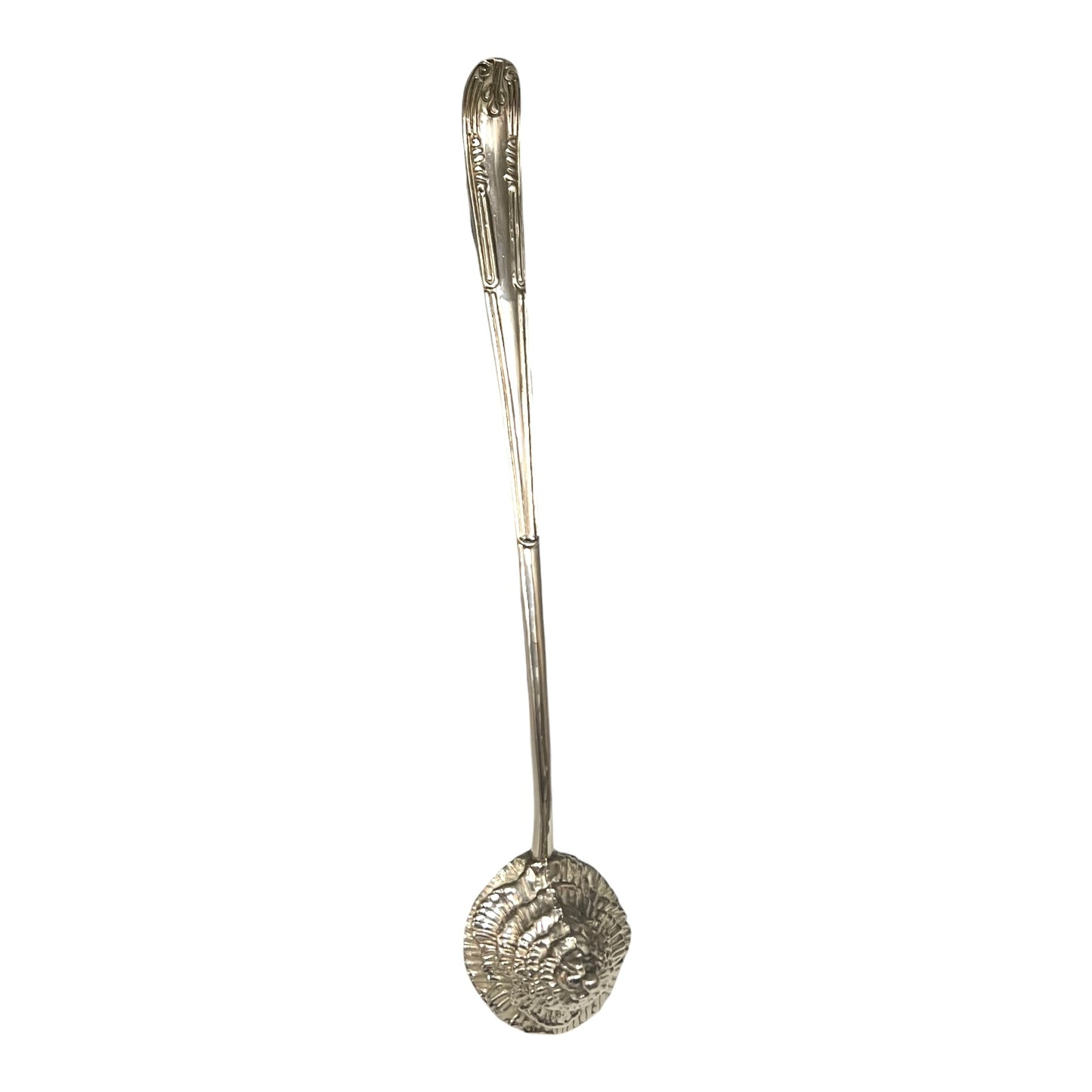 Decorative Christmas tree shaped silver candle snuffer on a white background