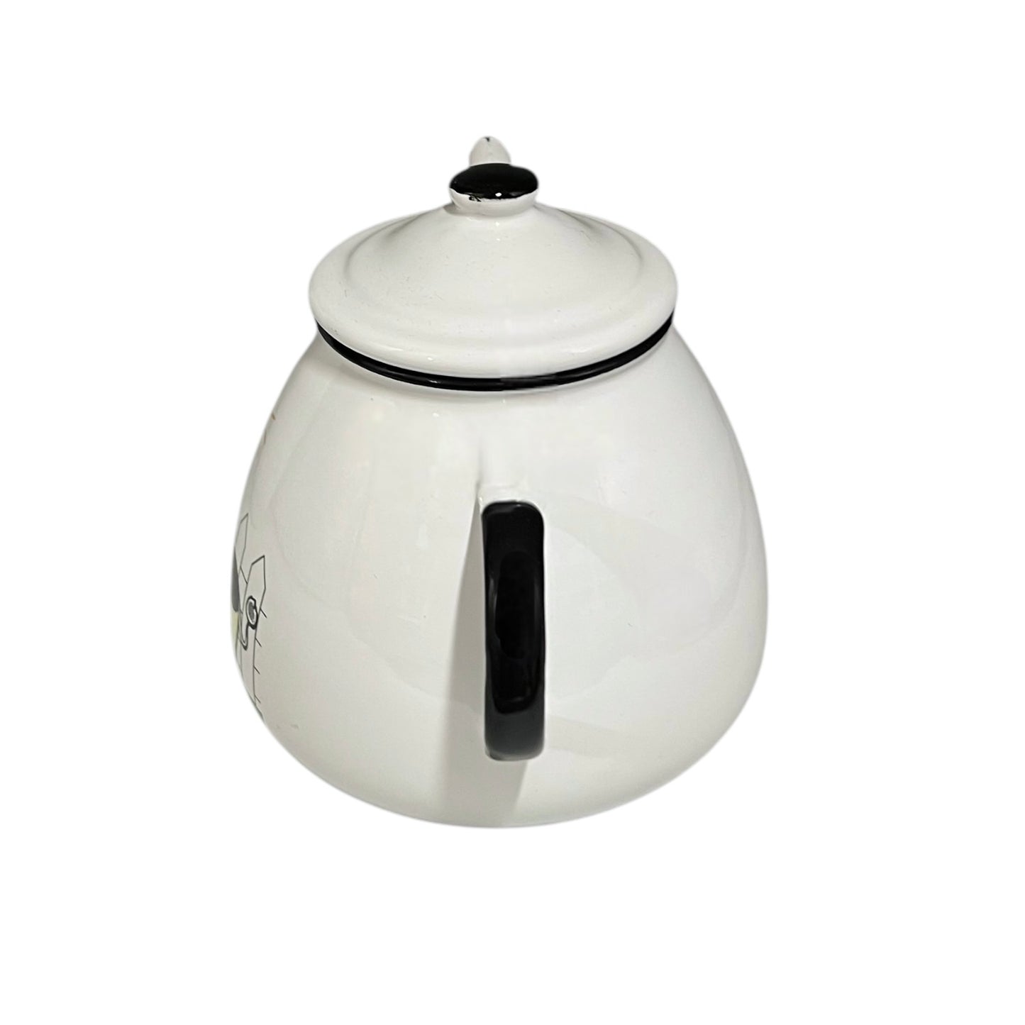 White teapot with black handle and lid on a white background