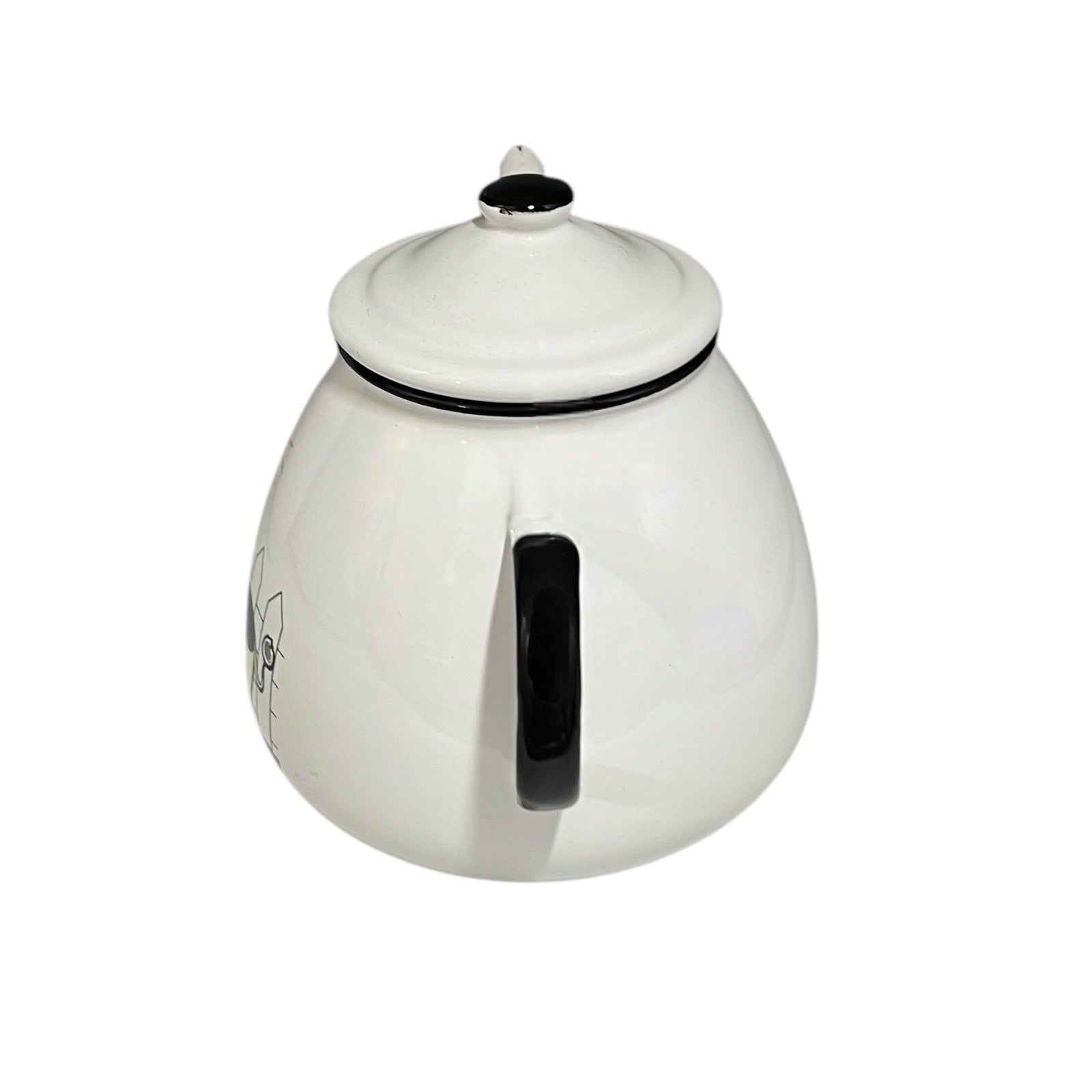 White teapot with black handle and lid on a white background
