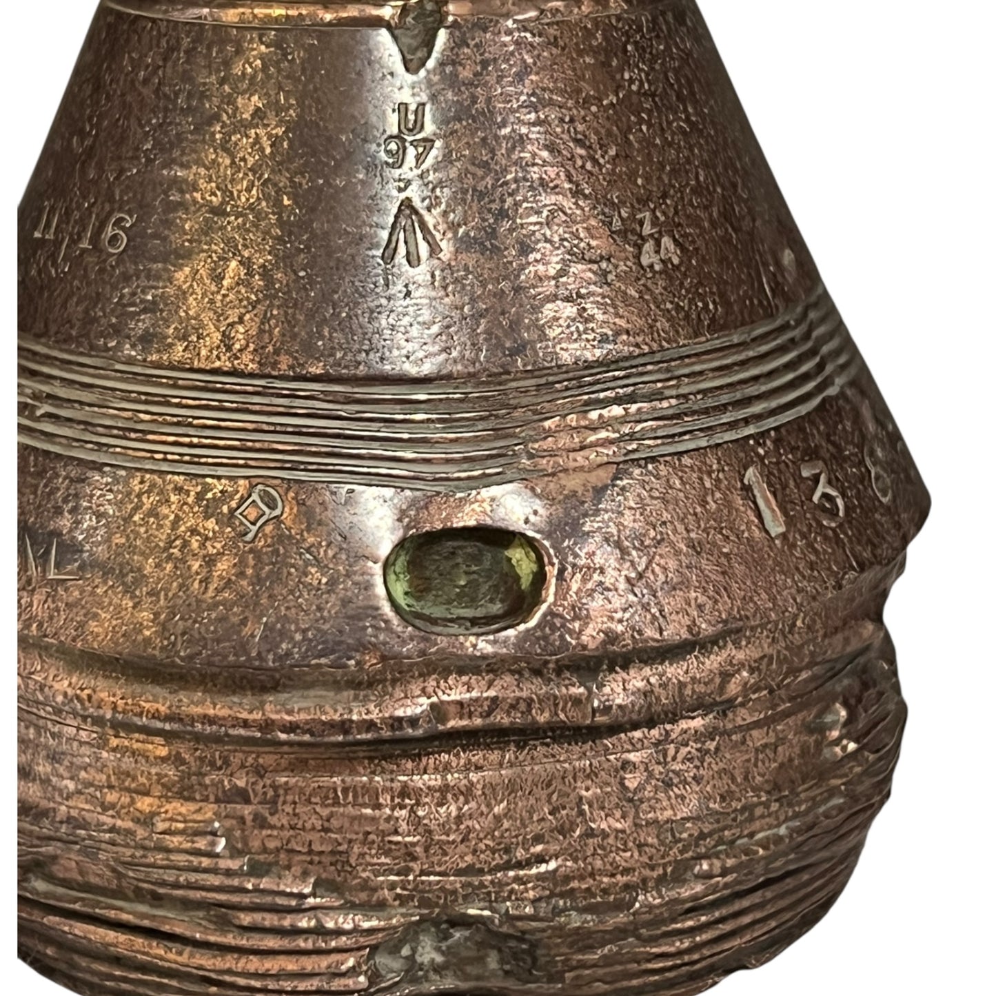 Brass metal cap fuse on a white background